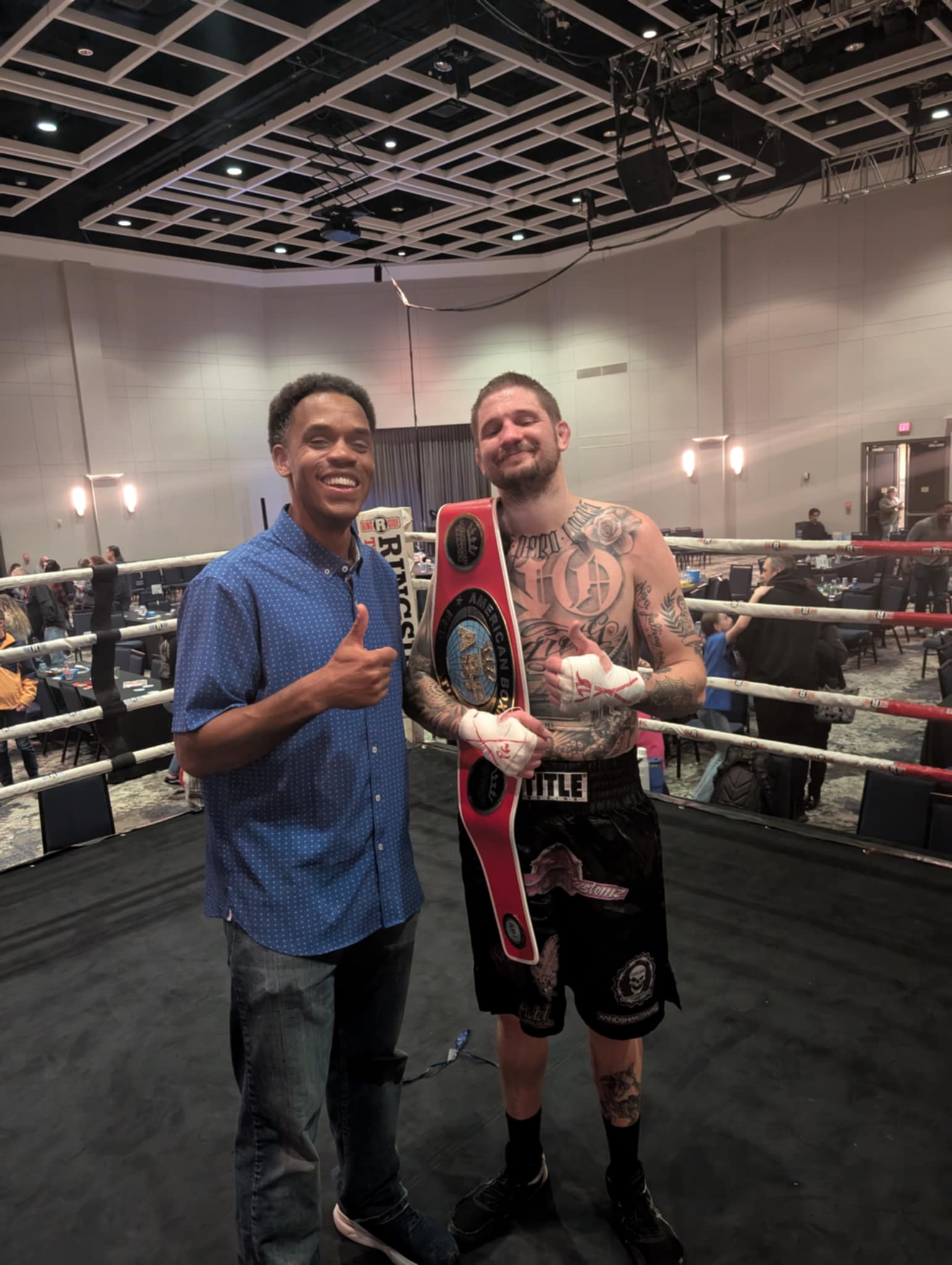 Eric 'the 1 Armed Bandit' Watkins with champion